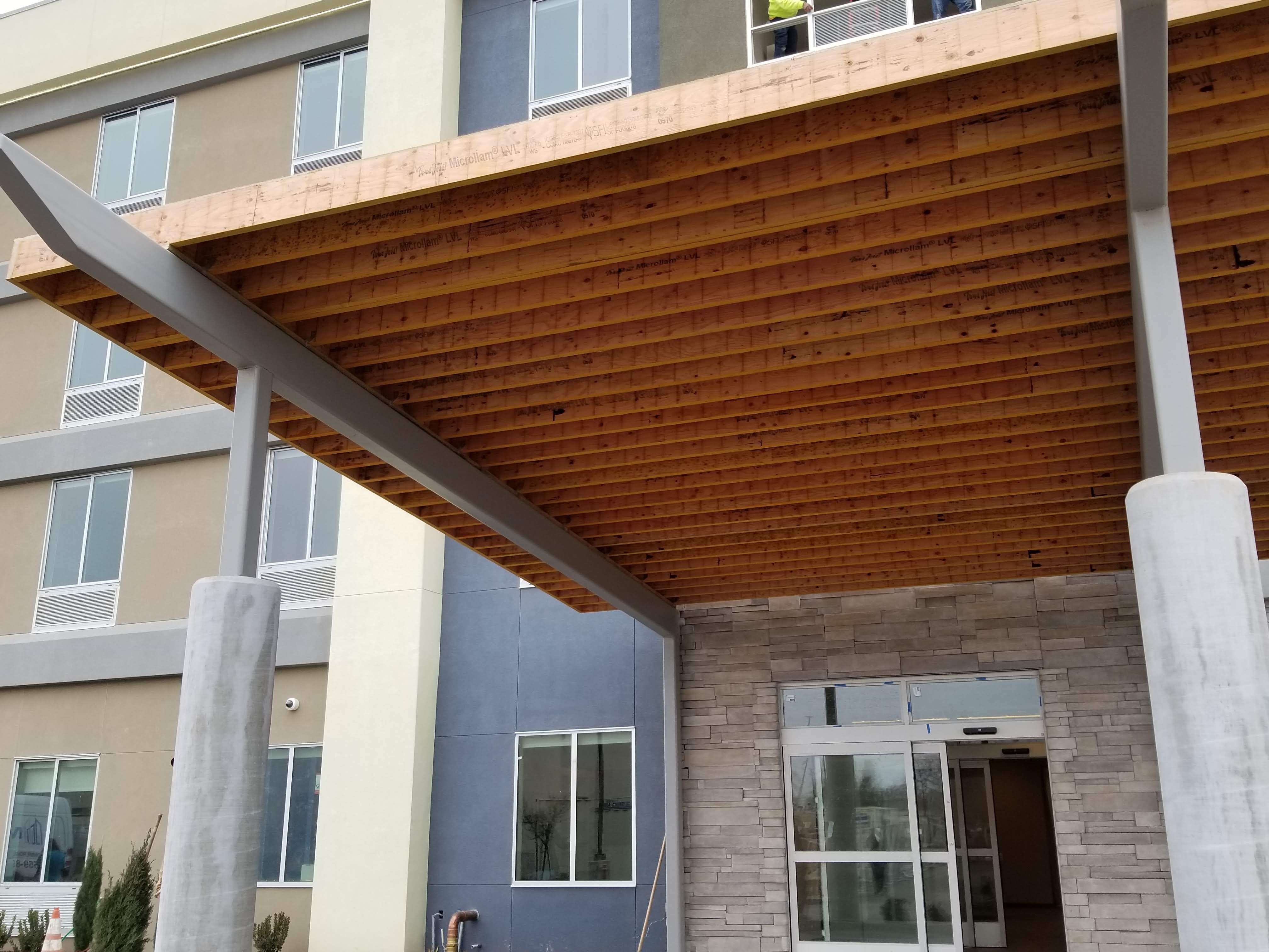 Hotel canopy wood beam framing