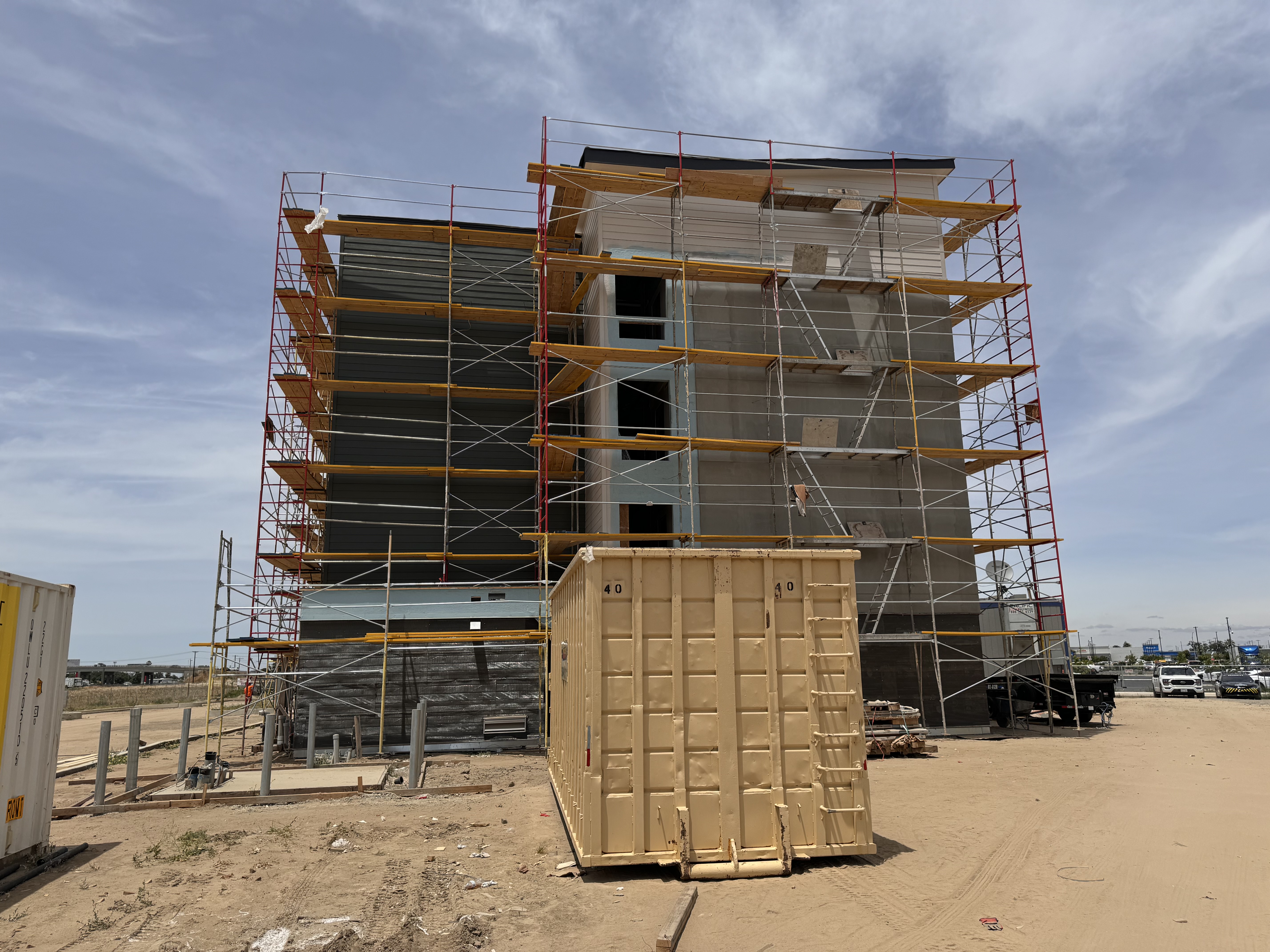 Hotel 5 story nearly complete with scaffold netting