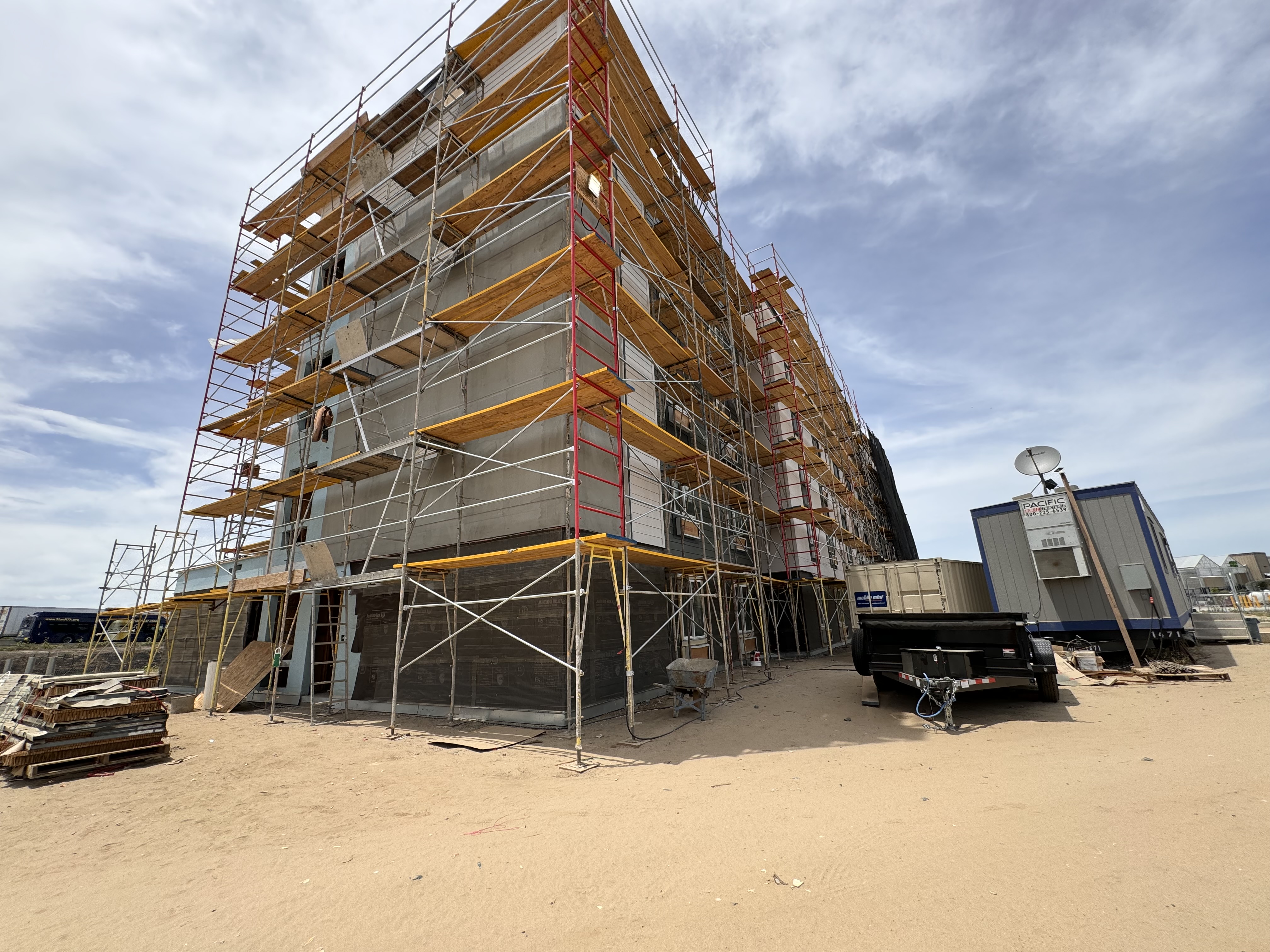 Hotel siding crew working on scaffold