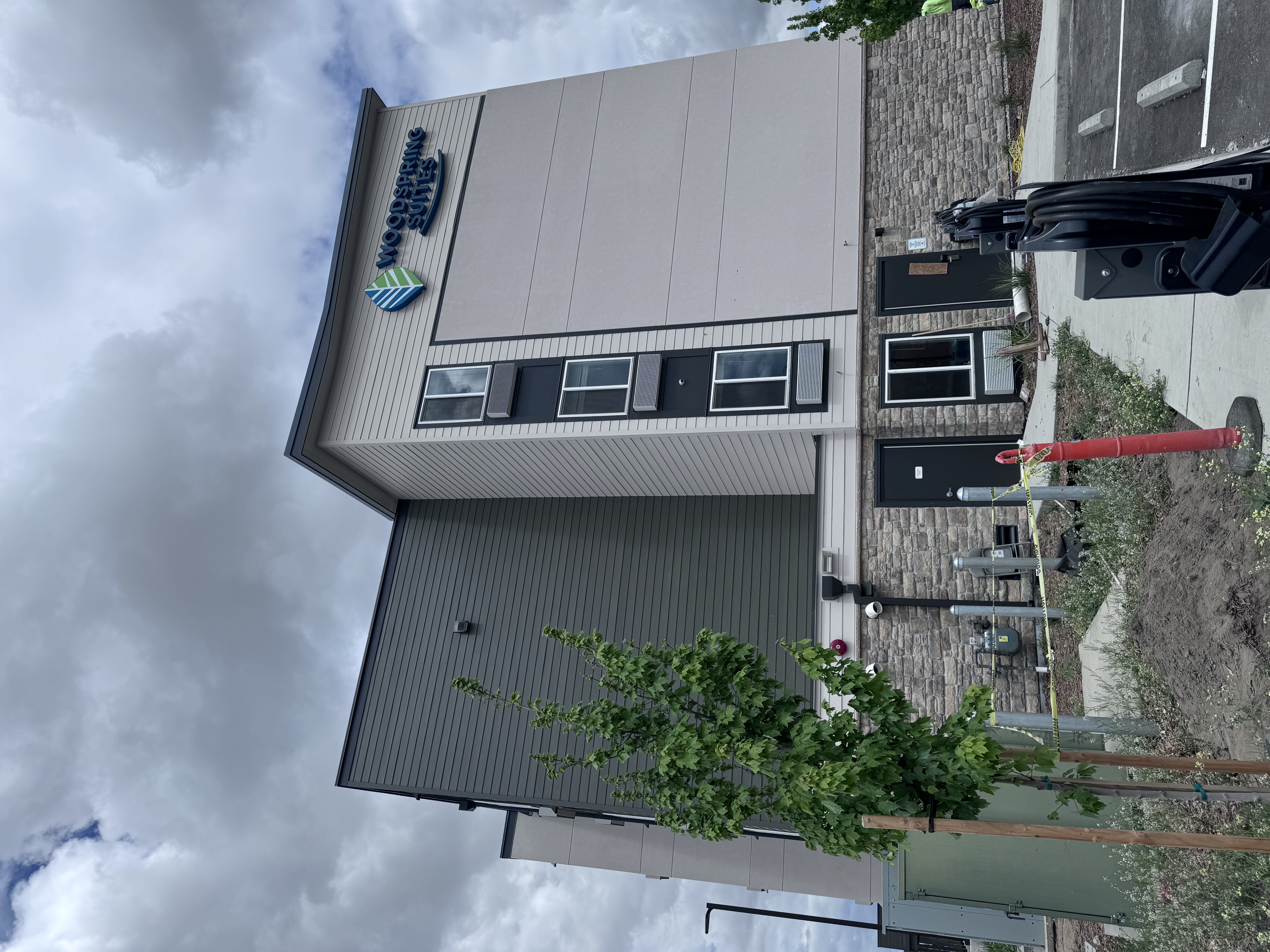 WoodSpring Suites sign corner finished