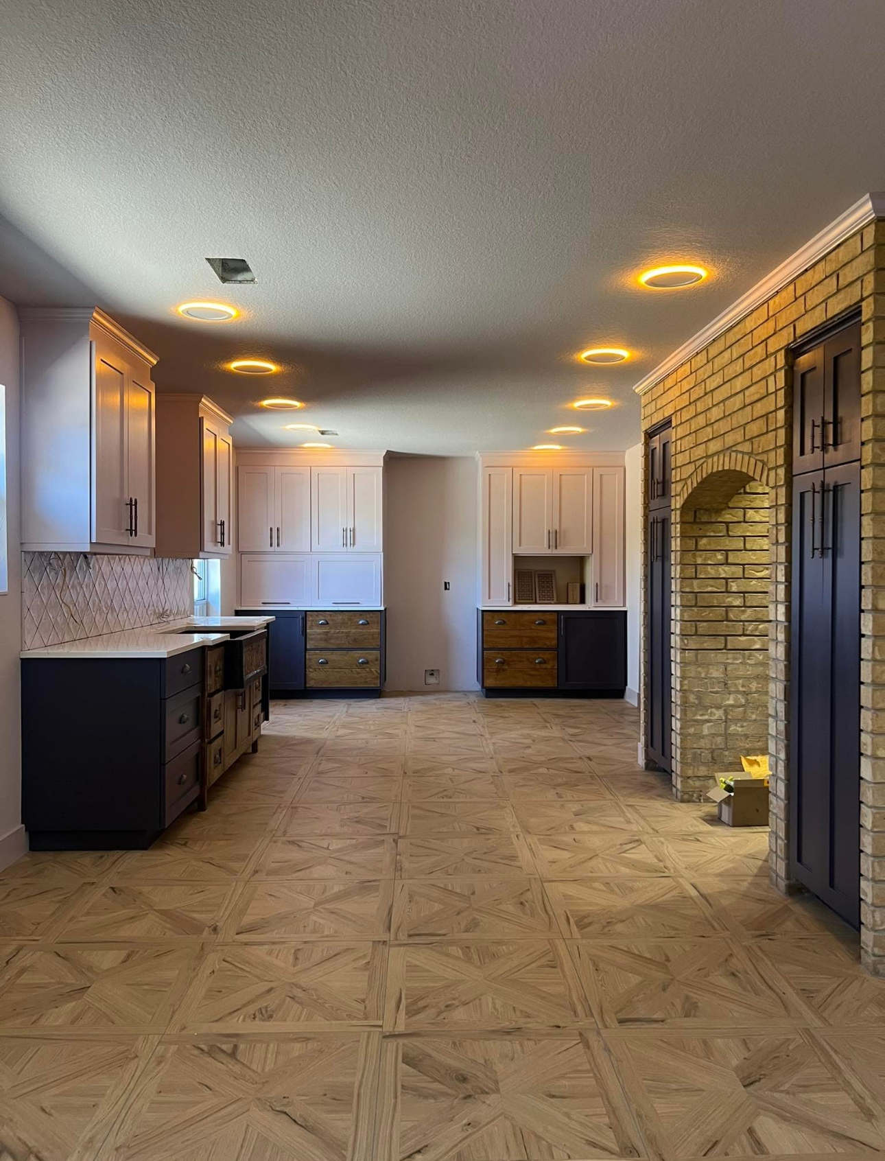 Dark kitchen remodel wine cellar